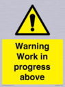gender-neutral-construction-warning-sign-warning-work-in-progress-above-with-exc~